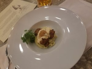 pretty plate of food with fried alligator and mirliton 