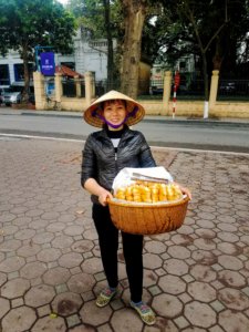 street food lady hanoi vietnam