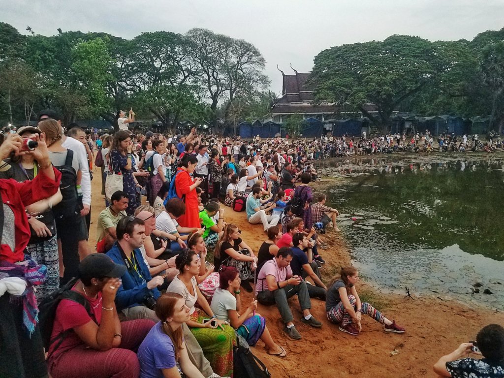 Crowds at Angkor Wat taking pictures at sunrise