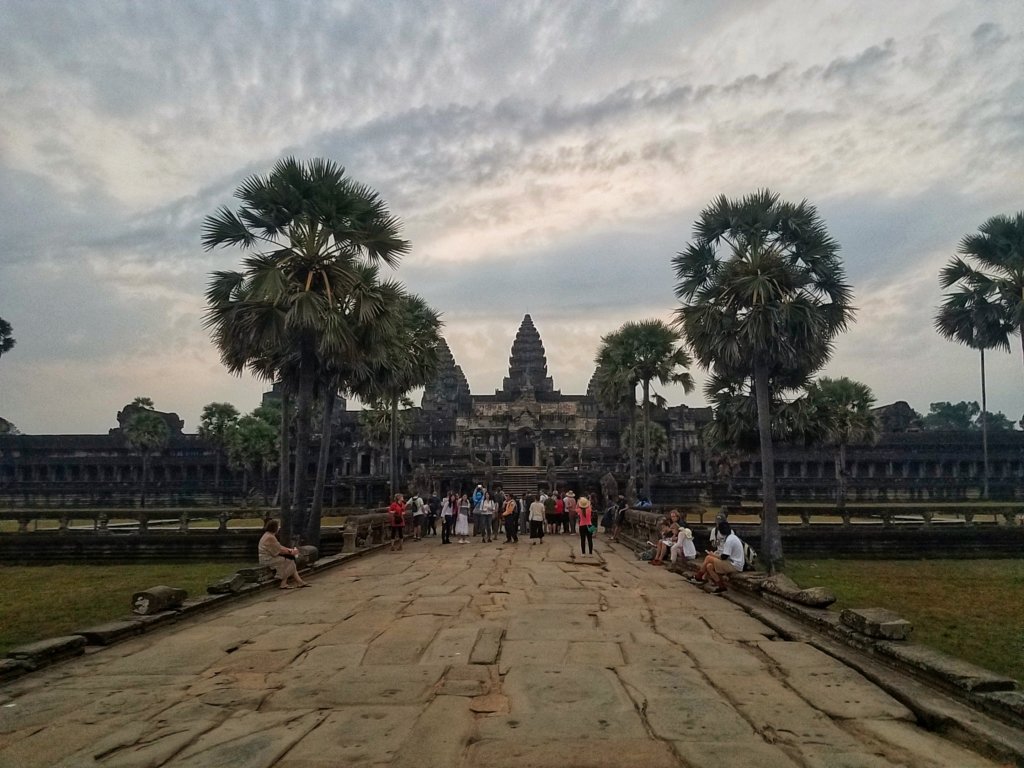 Tourists waiting for the gates of Angkor Wat to open at sunrise