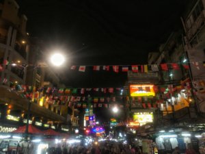crowded Khao San Road in Bangkok, full of tourists during night time