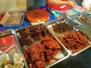 eating Luang Prabang beef jerky Laos