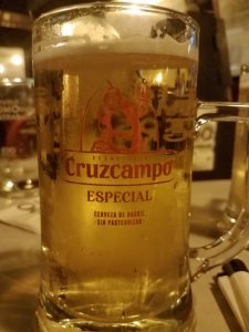 drinking Cruzcampo beer Seville Spain