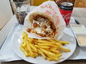 eating a doner kebap Lisbon Portugal
