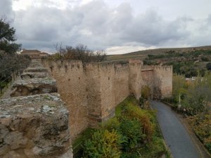 City Walls and ancient Roman gate at the old city of Segovia Spain