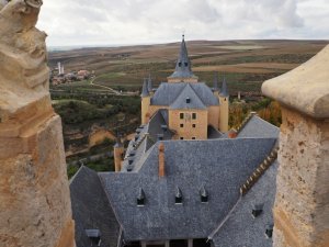 Segovia Alcazar Tower view of the countryside and castle rooftop