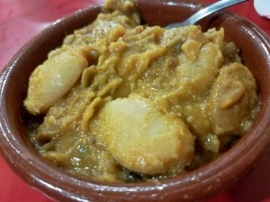 giant Spanish white beans in a thick stew with sausage