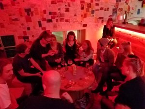 every type of hostel guest at a party in the hostel bar