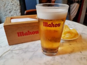 Drinking a glass of Mahou beer in Madrid Spain