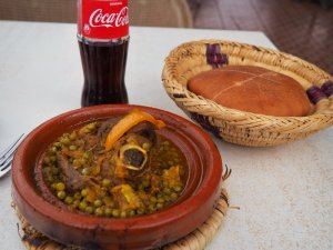 Moroccan meal of tagine, khoubz bread and coca-cola