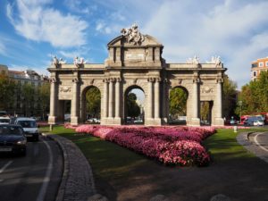 Puerta de Alacala Arch in the middle of the road in Madrid, Spain