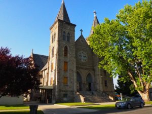 Exterior of Saint Francis de Sales Cathedral in Baker City on a sunny afternoon