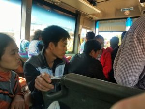crowded local intercity bus in Vietnam