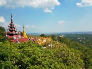 Buddhist temples atop Mandalay Hill ioverlooking city n Myanmar