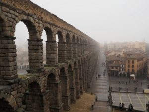 Roman Aqueduct Segovia Spain city center on a foggy day