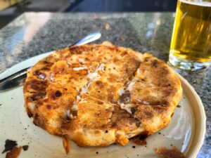 cheese and pastrami placinta pastry in Bucharest