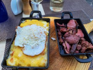 Eating in Brasov Romania lamb pastrami with bulz