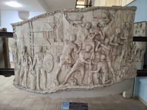 plaster cast relief of section of Trajan's column featuring Roman soldiers at National Romanian Museum of History in Bucharest