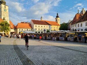 Crowded Sibiu Small Square with market stalls