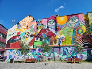 Large brightly colored mural in St John's Square, Brasov