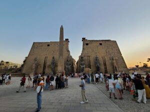 Crowds of tourists gathered outside the entrance to Luxor Temple