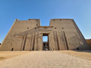 Entrance to Temple of Edfu in Upper Egypt with very few tourists