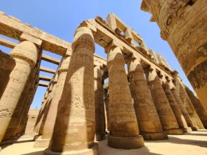 Ancient art and inscriptions on the columns of the Great Hypostyle Hall Karnak Egypt