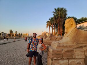 Hangry Backpackers at the Avenue of Sphinxes in Luxor Egypt