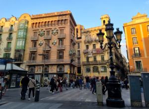 tourist crowds in a neighborhood square in Barcelona